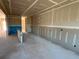 Unfinished living room with blue drywall and view to other spaces in the home at 628 Gilles Ln, Cumming, GA 30041