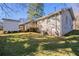 House exterior showcasing backyard and deck at 2190 Greystone Way, Decatur, GA 30032