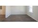 Simple dining room with hardwood floors and neutral wall colors at 2190 Greystone Way, Decatur, GA 30032