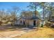 Charming ranch home with mature trees and a paved driveway at 2190 Greystone Way, Decatur, GA 30032