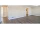 Clean hallway with hardwood floors and neutral wall colors at 2190 Greystone Way, Decatur, GA 30032