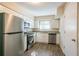 Modern kitchen with stainless steel appliances and granite countertops at 2190 Greystone Way, Decatur, GA 30032