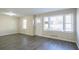 Living room with hardwood floors, neutral walls, and an open concept at 2190 Greystone Way, Decatur, GA 30032