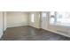 Open living room with hardwood floors and neutral wall colors at 2190 Greystone Way, Decatur, GA 30032