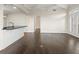 Open concept living area with hardwood floors and kitchen access at 2255 Peachtree Ne Rd # 724, Atlanta, GA 30309