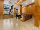 Elegant lobby with wood paneling, piano, and staircase at 2255 Peachtree Ne Rd # 724, Atlanta, GA 30309