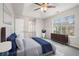 Spacious bedroom with large window and neutral decor at 4057 Crossings Way, Stone Mountain, GA 30083