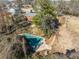 Aerial view showing home's pool and surrounding landscape at 4386 Bluebird Ln, Lithia Springs, GA 30122