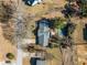 Aerial view of house, yard, and pool at 4386 Bluebird Ln, Lithia Springs, GA 30122