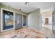 Bright entryway with tiled floor, gray door, and side windows at 4386 Bluebird Ln, Lithia Springs, GA 30122