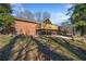 Brick house exterior with large deck and backyard at 4386 Bluebird Ln, Lithia Springs, GA 30122