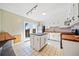 Kitchen with white cabinets, wood countertops, and island at 4386 Bluebird Ln, Lithia Springs, GA 30122