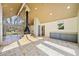 Open living area with vaulted ceiling, fireplace, and tiled floors at 4386 Bluebird Ln, Lithia Springs, GA 30122