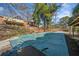 In-ground pool with pool cover and large backyard at 4386 Bluebird Ln, Lithia Springs, GA 30122