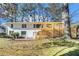 Spacious backyard with a large deck and stairs leading to the ground at 1863 Bruce Ne Rd, Atlanta, GA 30329