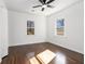 Well-lit bedroom with hardwood floors and ceiling fan at 1863 Bruce Ne Rd, Atlanta, GA 30329