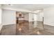 Large basement recreation area with wet bar and polished concrete floors at 1926 Fairway Ne Cir, Brookhaven, GA 30319