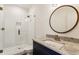 Modern bathroom with a frameless shower, subway tile, and a stylish vanity at 1926 Fairway Ne Cir, Brookhaven, GA 30319