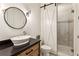 Modern bathroom with a walk-in shower and floating vanity at 1926 Fairway Ne Cir, Brookhaven, GA 30319