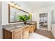 Bathroom with double vanity and large mirror at 1926 Fairway Ne Cir, Brookhaven, GA 30319