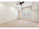 Well-lit bedroom featuring a ceiling fan and large window with blinds at 1926 Fairway Ne Cir, Brookhaven, GA 30319