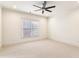 Well-lit bedroom with ceiling fan and carpet flooring at 1926 Fairway Ne Cir, Brookhaven, GA 30319