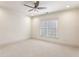 Spacious bedroom with ceiling fan and neutral carpeting at 1926 Fairway Ne Cir, Brookhaven, GA 30319