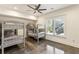 Basement bedroom with two sets of bunk beds and polished concrete floors at 1926 Fairway Ne Cir, Brookhaven, GA 30319