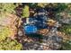 Overhead view of house, pool, and surrounding trees at 2529 Piney Grove Rd, Loganville, GA 30052