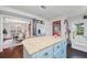 Kitchen with view into dining room and granite island at 2529 Piney Grove Rd, Loganville, GA 30052