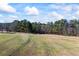 Wooded 5 acre lot with open field at 2529 Piney Grove Rd, Loganville, GA 30052