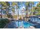 Large inviting pool with diving board and gazebo at 2529 Piney Grove Rd, Loganville, GA 30052