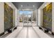 Modern building lobby with grey stone and living wall accents at 3324 Peachtree Ne Rd # 1510, Atlanta, GA 30326