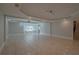 Finished basement with tile floors and recessed lighting at 3374 Islesworth Trce, Duluth, GA 30097