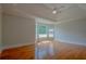 Spacious bedroom with hardwood floors and tray ceiling at 3374 Islesworth Trce, Duluth, GA 30097