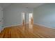 Bright bedroom with hardwood floors and access to bathroom at 3374 Islesworth Trce, Duluth, GA 30097