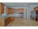 Spacious kitchen with granite countertops and stainless steel appliances at 3374 Islesworth Trce, Duluth, GA 30097