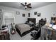 The bedroom features a rustic wood platform bed frame and industrial style decor at 3227 Hidden Valley Cir, Lawrenceville, GA 30044