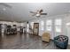 Open-concept living room flows into a well-appointed kitchen with a large kitchen island and modern stainless appliances at 3227 Hidden Valley Cir, Lawrenceville, GA 30044