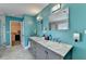 Elegant bathroom with double vanity, marble, and walk-in shower at 861 Chandler Rd, Lawrenceville, GA 30045