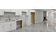 A finished basement with white cabinets, recessed lights, and a fireplace at 1320 Melbenan Dr, Atlanta, GA 30311