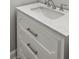 A close up shot of a bright vanity with marble countertop at 1320 Melbenan Dr, Atlanta, GA 30311