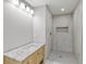 Updated bathroom featuring marble walk-in shower, light wood vanity, and recessed lighting at 1320 Melbenan Dr, Atlanta, GA 30311