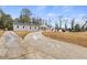 Stylish front exterior with a new driveway and landscaped front yard at 1320 Melbenan Dr, Atlanta, GA 30311