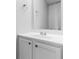Bathroom featuring white sink, a mirror, and tile floors at 2916 Ward Lake Way, Ellenwood, GA 30294