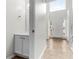 Bright entryway featuring tile floors, neutral walls, and a sink on the left at 2916 Ward Lake Way, Ellenwood, GA 30294