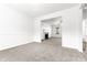 Spacious living room with fireplace and open view to another room at 2916 Ward Lake Way, Ellenwood, GA 30294