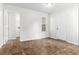 Spacious living room featuring neutral walls, one window, and tile floors at 2916 Ward Lake Way, Ellenwood, GA 30294