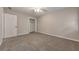 Well-lit bedroom with ceiling fan and large closet at 4851 Ridgewood Creek Nw Dr, Acworth, GA 30102