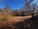 Ranch home with a large backyard and wooded area at 3246 Wallace Lake Rd, Douglasville, GA 30135